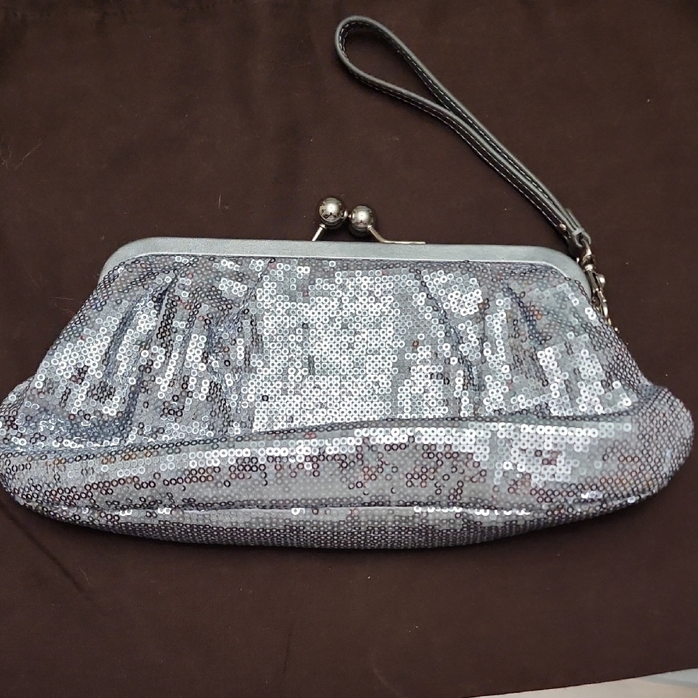 Coach Silver Clutch Wristlet with Vintage Design